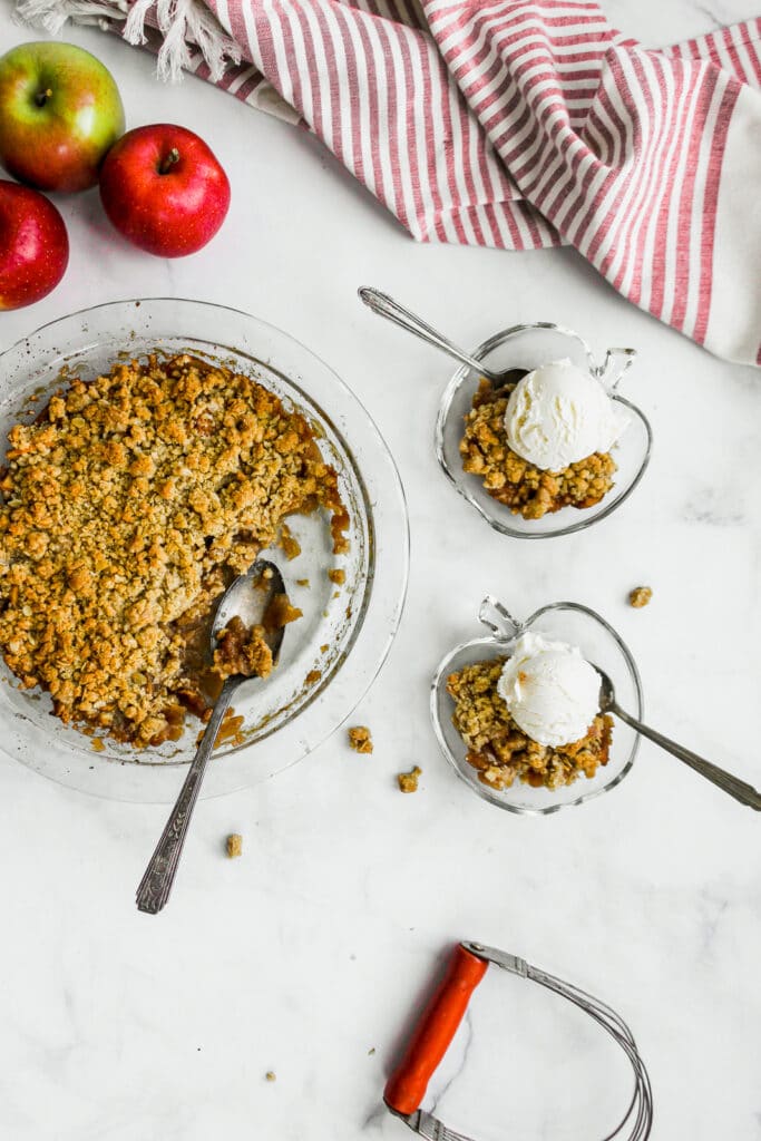 Tempting bowls of easy apple crisp with ice cream.