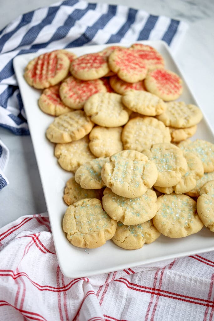 Red, white, and blue sprinkle topped sugar cookies.