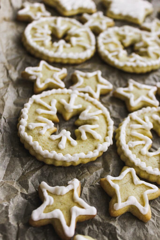 Piped sugar cookies with buttercream frosting.