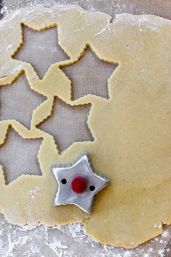 Sugar cookie dough cut out as stars.