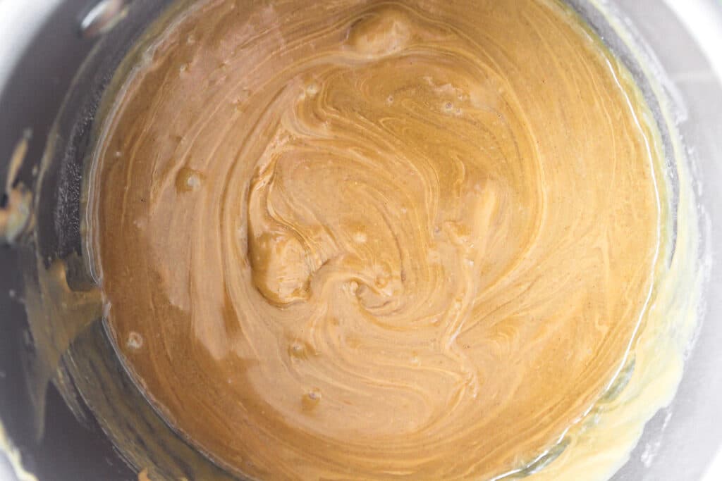 Peanut butter mixture that is ready for the cheerios to be added.