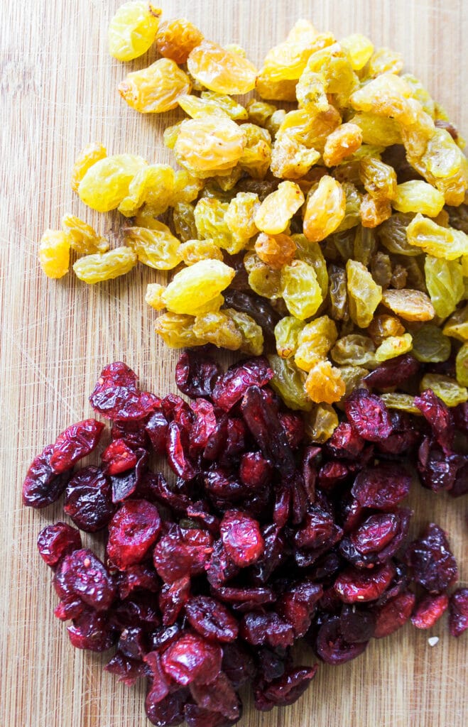 Measure the dried cranberries and golden raisins.