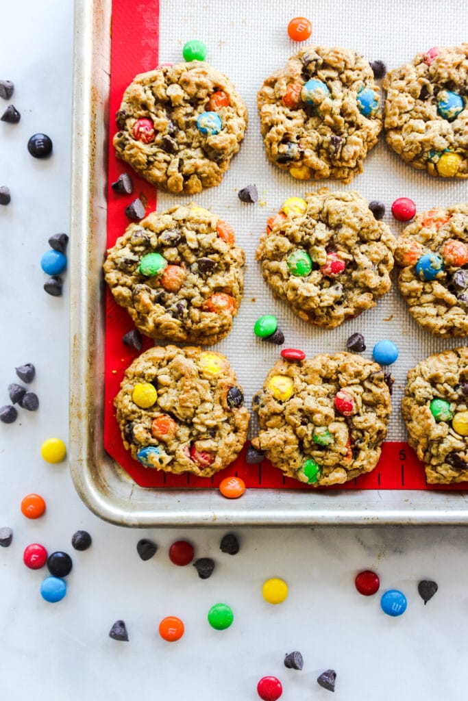 Tray of baked flourless monster cookies.