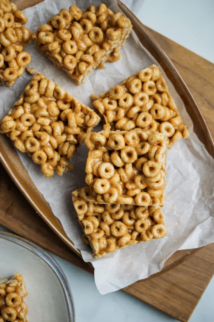 Peanut butter cheerio bars on a platter.