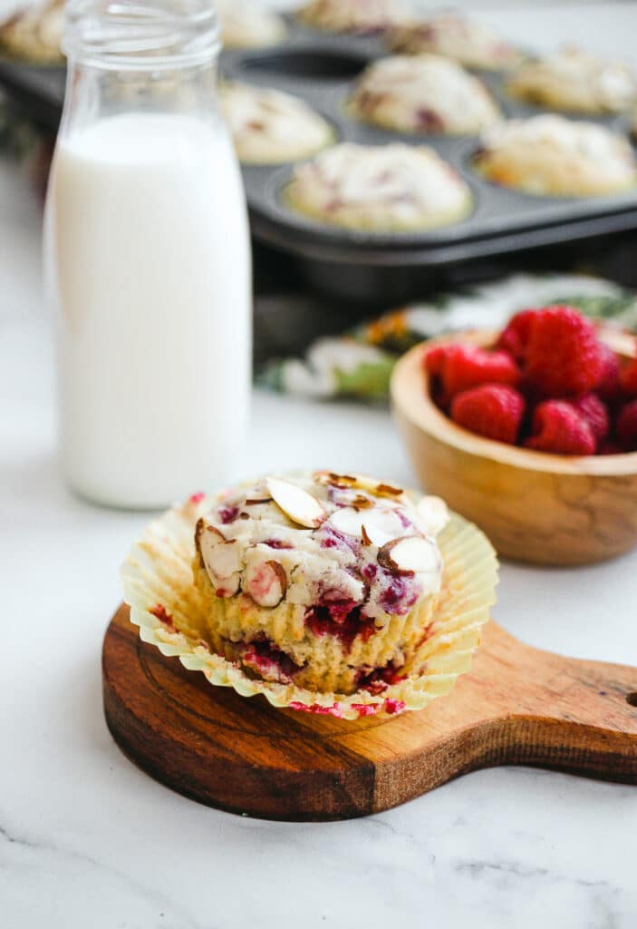 Raspberry almond muffin with milk.